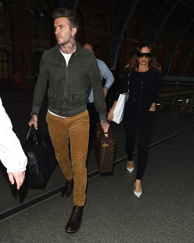 David Beckham And Victoria Beckham Arrive In London
